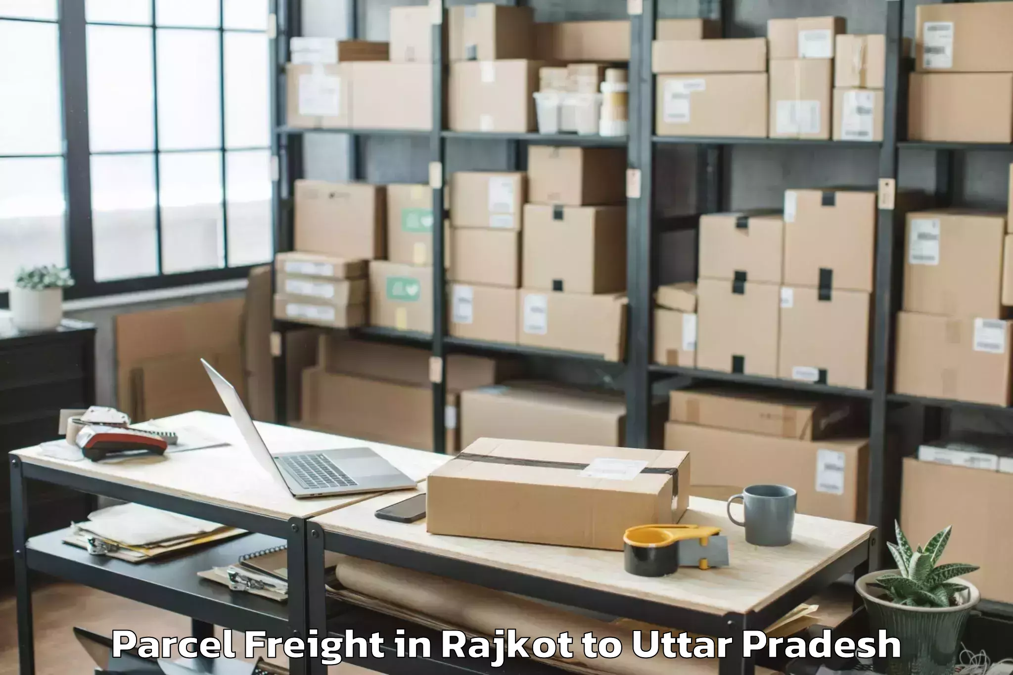 Book Rajkot to Mankapur Parcel Freight Online